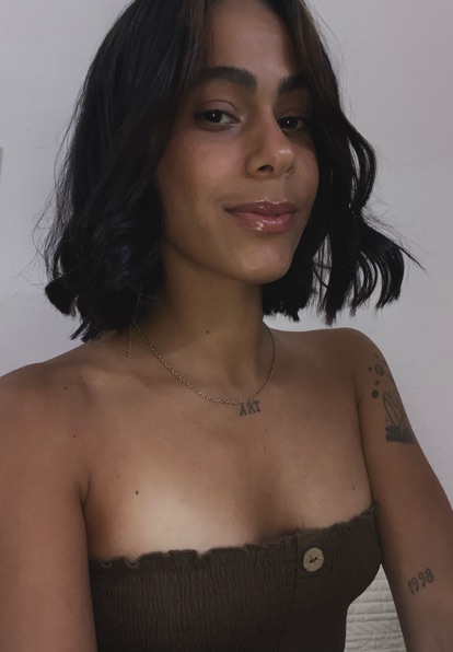 Adult woman smiling softly