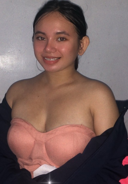 Adult woman with a playful smile